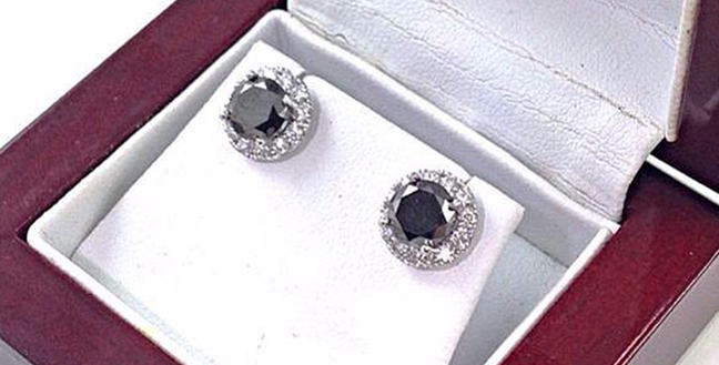 Custom Design: 2.00 carat round Black diamonds set in 18k white gold diamond halo stud setting.