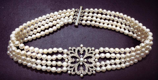Custom made four strand cultured fresh water pearl choker style necklace.